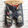 Одежда для брендов лето разорванные отверстия джинсовые шорты мужчины хлопок тонкие прямые ретро -байкерс