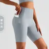 Lu yoga shorts ontwerper dames topkwaliteit luxe mode shorts naakt feel onhandigheid linie broek broek taille perzik heup pocket broek sport fitheid kortlopen