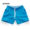 Homens de verão shorts casuais secagem rápida fitness curto homme praia feminino lasco de prancha de praia elástica cintura de ginástica sólida roupas 240417