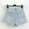 Kvinnors shorts sommar trasiga jeans kvinnor kort midja diamant tasslar y2k kvinnors avslappnade botten denim shorts kvinnor mode y240420