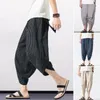 Męskie spodnie luźne fit harem letnie przycięte z elastycznym sznurkiem w paski w paski do streetwearii