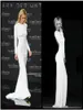 Smickrande långa ärmar vita aftonklänningar mantel spandex sexiga rygglösa långa klänningar kväll slitage 2016 nyaste1441849