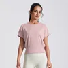 Chemises actives Femmes Loose Yoga Shirt Short Sports Sports Side Pleas Workout Running Top Sexy Gym Wear Push Up Exercice
