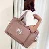 Bolsas de venda quente Mulheres sacolas de viagem Bolsa de ombro de muffle grande multifuncional para meninas feminino grande capacidade esportiva de bolsas de bagagem de armazenamento