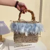 Bohemian Feather Straw Bag Handväska Designer Bambuhandtag Korgväska axelväskor för kvinnor 2023 Resor vävda rotting strandväskor