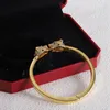 Pulsera de oro de lujo Cabeza de tigre para mujer Arpletas de brazaletes para hombres Diamantes Diseñador de diamantes Joyas Damas Cualquier situación Accesorios clásicos con caja