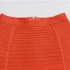 Jupes solides sexy enveloppées de hanche pour femmes 2024 Fashion d'été pour femmes hautes zipper skinny midi jupe élégante bandage