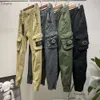 Diseñador Man Pantalones de carga Stone Spring y Autumn Stretch múltiples de bolsillo reflectante recto Sports Fiess Irts informales Joggers Islands 655