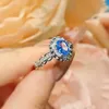 Cluster anneaux 3 s Blue Topaz Gemles 5a Zircon Diamonds Fleurs pour les femmes Ban de doigt rempli de ordes pour femmes