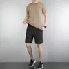 Brand wholesale and spot quick drying clothes for men's summer loose short sleeved t-shirts Sportwear breathable and sweat wicking fitness and leisure top sets shorts