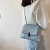 Bolsos de hombro Hilo de bordado V-Line PU Leather Crossbody Fashion Bags de diseño para mujeres de alta calidad