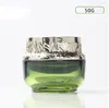 Speicherflaschen leer grüne Cremeglas Glas Modekosmetische Verpackung für Gesicht