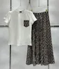 24 Women's Top Double Pocket Printed T-shirt Double Printed Half Skirt Set 420