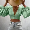 エレガントでセクシーな女性のVネック長袖ショートショートTシャツは、秋のために固体色の短いTシャツ
