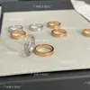 المصمم الشهير كارتر الضيق الطبعة الكاملة Sky Star Ring CNC Diamond Three Rows 18k Rose Gold زوجين