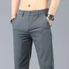 Pantalon masculin d'été extension décontractée hommes fines affaires de mode douce élastique coréenne slim de vêtements masculins pantalon gris vert noir