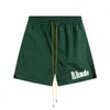 24 Designer Mens Short Rhude Shorts mode Loose plus courte Femmes plus courtes Sage de noix de noix de noix de noix