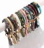 Pulseira de couro PU 12pcs/lote ne mixed bangle chaveiro de chave de anel de chave de anel para mulheres Mades Made3695162