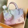 GO TOTES ON THE TOTES TOP高品質のデザイナーハンドバッグ女性レザーブラウンフラワークロスボディショルダーバッグファッションメンズウィークエンダートップハンドルクラッチショッパーDHGATEバッグ