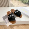 Sandales de designer célèbres Femme Woody Clogs Slippers Letter LETTR IMPRESS TOUVE SANDALS FEUSE FEURES PLATSORES PLIPES SADELS SADELS SABLES CHAPEURES SULDER