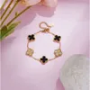 Dr Jewelry Nouveau acier inoxydable 18 carats en or à double face zircon Bracelet de trèfle à quatre feuilles pour la Saint-Valentin