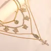 Naszyjniki wiszące punkowe vintage wielowarstwowe portretowe monety krzyżowe Naszyjnik dla kobiet złoty kryształowy łańcuch tenisowy biżuteria nowa Y240420