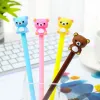 Pens 50pcs oldukça havalı sevimli kawaii pembe ayı jel kalem mavi mürekkep kırtasiye kawai ofis aksesuarı okula geri dön