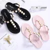 Tofflor flip flops kvinnor lyxiga sandaler fashionabla pearl beach fest sexiga ben skor damer