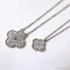 2024 Designer Four-leaf 925 Pure Silver Plated 18k Rose Gold Lucky Clover Full Diamond Necklace Womens Mini Small Crowd Chain