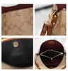 Luxury Designer Highs Highs Quality Texture Simple Texture Bag Michael Kadar Women's Backet Back 2023 New Fashion Cow-Wide Messagers Bag Bag de banlieue sac à main sac