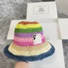 Designer pêcheur de pêcheur nouveau style arc-en-ciel arc-en-ciel creux de pêcheur tissé étoile même style chapeau d'été de voyage de voyage Sunshine Sunshine Big Brimmed Hat (B0147)