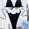 Kvinnors badkläder Deka Hollow Out Brasilian Pearl Bikini Set Black Triangle Strap Push Up Micro Swimsuit High midje strandbaddräkt