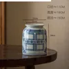 Vasos Creative Ceramic pintado à mão Vaso azul e branco Chinese Retro Storage Jarra de estar Arranjo de flores da sala de estar