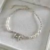 Chain WANZHI Advanced Splicing Bow Pendant Bracelets for Women Luxurious Pearl Metal Splicing Bracelet Fashionable Jewelry Accessories Y240420