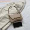 Bolsa de nudo bolso Crossbody Mujeres Comprador de mujeres bolso sólido Bolso de axila Persalidad Persalidad de metal Hebilla de mechón A1TG#