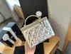 Zaawansowany nowy diamentowy łańcuch przenośna torba na ramię z górnym diamentowym uchwytem TOTES METAL HARDARWA Crossbody 18x16cm