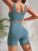 Set di yoga a coste senza soluzione di continuità Allenamento per donne 2 pezzi in palestra Crop Crop Shorts High Waist Outfit Fitness in esecuzione 240415