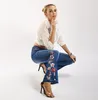 Dżinsy damskie europejskie i amerykańskie spodni 3D trójwymiarowe hafty haftowe rozszerzone stopy Drag Woman
