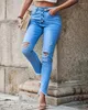 Jeans da donna 2024 design tascabile abbottonato con taglio di denim pantaloni alla moda di moda magra magra a lungo