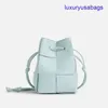 Womens Designer Cassette Cross-Body Bucket BotegaVeneta Mini/Small Sizes Intreccio Leather Cross-body Bucket Bag Interior Open Pocket Drawstring Closure HBI8