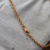 Halsketten 3,0 mm Gold plattiert O geformte reine Titankettenkette Halskette mit Vintage Münze menschlicher Kopf Anhänger Pendellist Kette