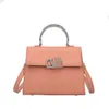 Yeni moda lüks küçük kare el çantası yüksek dereceli düz renkli omuz çantası Kadın Günü paketleri çok yönlü çapraz gövde çantası