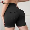 Shorts actifs Athvotar Solid Yoga Femmes High Waist Gym surélevées Busports extérieurs Pantalons courts de sports de fitness Outdoor avec poches