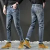 Designer de jeans masculin automne et hiver nouveau jeans de qualité masculine slim slim small pieds pantalon long mode lwh ht762f