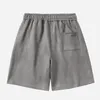 Shorts maschi in tessuto da forno atletico estivo con tasche elastiche della vita da coda gamba che corre in colore solido