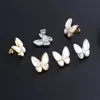 Charme de créateur van quatre feuilles d'herbe d'herbe femelle papillon blanc fritillaria boucles d'oreilles réseau de mode personnalisé rouge