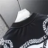 Camiseta de moda Men e feminino T-shirt Roupas de gola alta de gola alta Camisa de letra de letra do peito casual Street Sleeves Shirt Shirt M-3xl #012