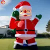 Activités de plein air en gros 12mh (40 pieds) avec ventilateur oxford matériau géant gonflable Santa Claus Christmas Old Father Cartoon à vendre