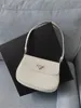 Faashion Real Cuero para mujer Bolsa de axila para hombres Luxurys Bolsas de embrague de diseñador