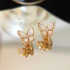 Boucles d'oreilles Van Version Van Version Van pour les femmes avec une coque à nœud papillon Fritillaria blanche Free Free